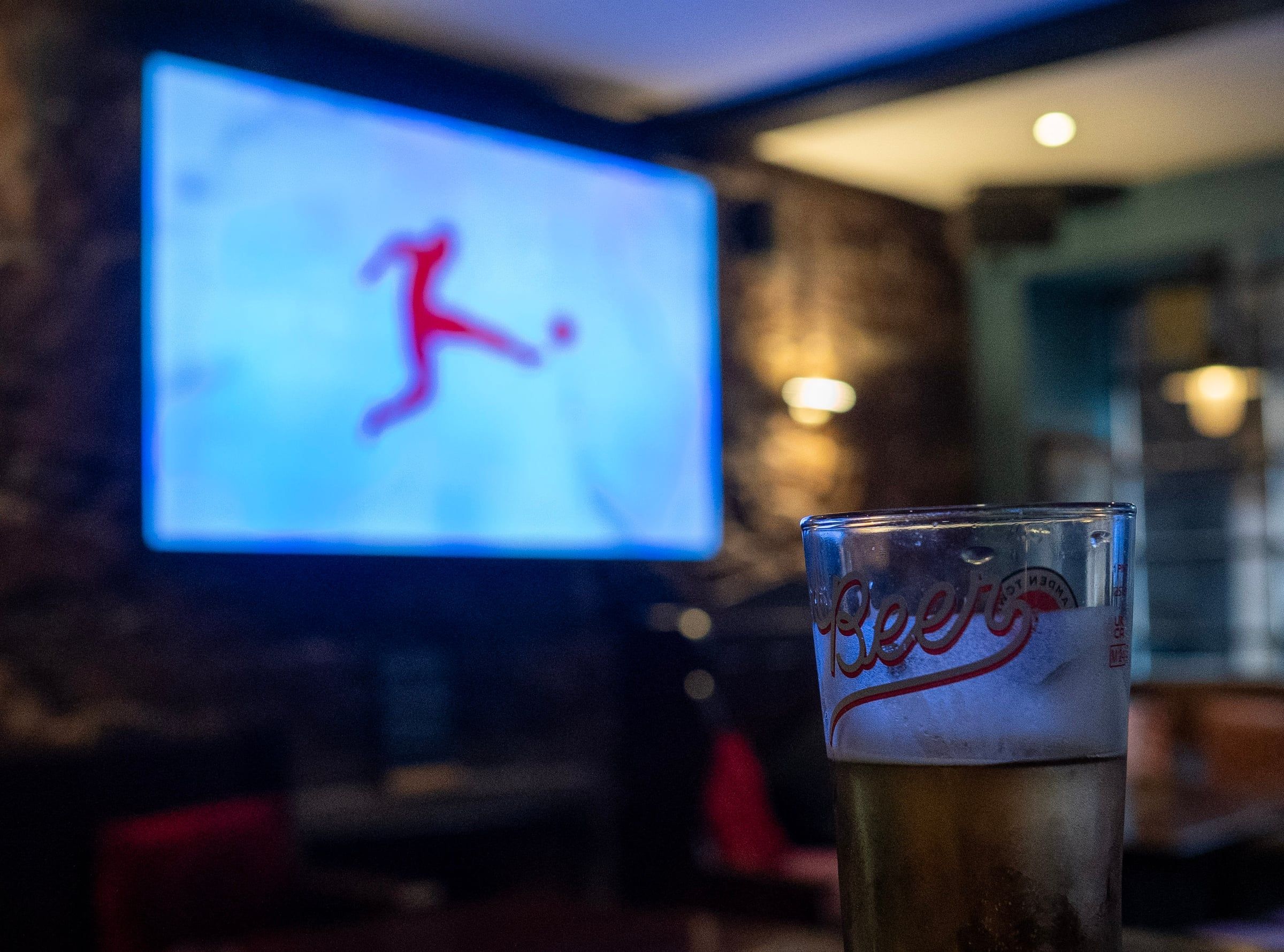A pint in front of the big screen