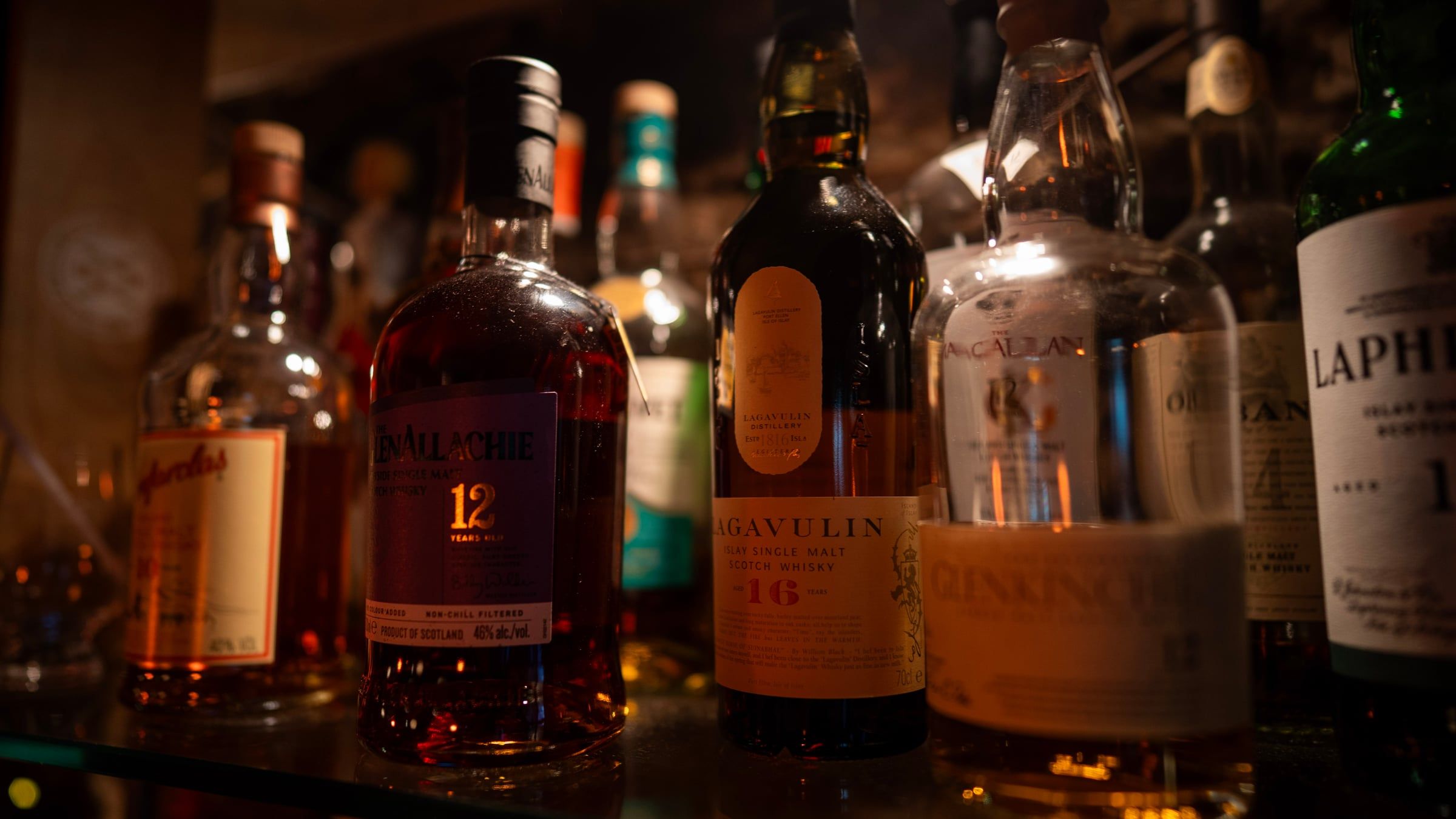 GlenAllachie, Lagavulin and Macallan on the back bar