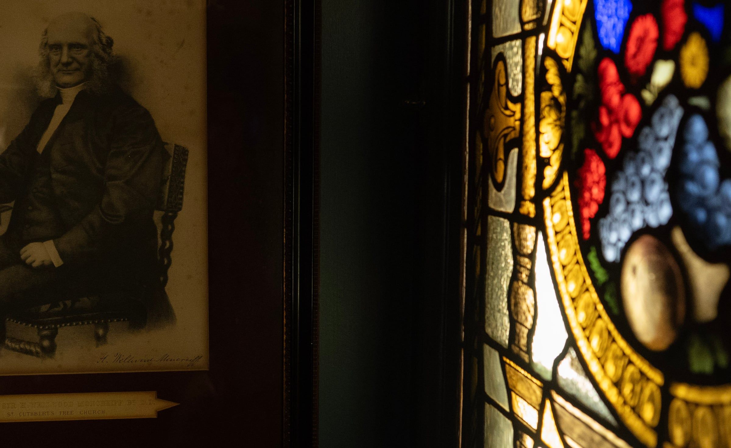 The stained glass by the door